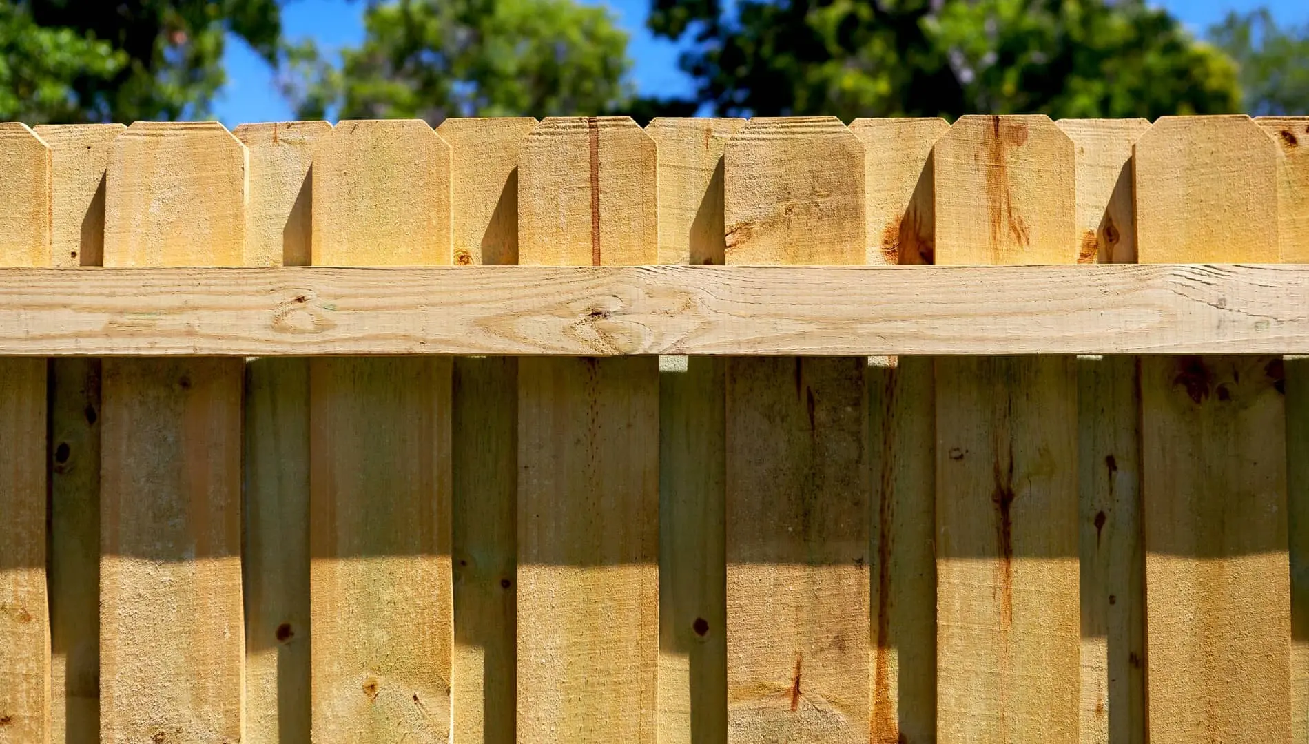 Arkansas Fence Company wood fence irrigation considerations